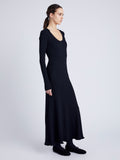 Proenza Schouler Side full length image of model wearing Elie Knit Dress in Viscose Rib in BLACK