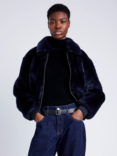 Proenza Schouler Front cropped image of model wearing Anais Bomber in Shearling in INK