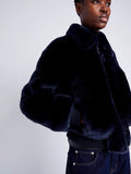 Proenza Schouler Detail image of model wearing Anais Bomber in Shearling in INK