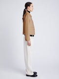 Proenza Schouler side image of model wearing Emilie Jacket in Double Face Wool in CAMEL