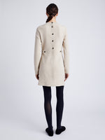 Proenza Schouler Back full length image of model wearing Apollo Knit Dress in Cloque in OATMEAL MELANGE