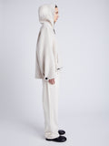 Proenza Schouler Side full length image of model wearing Isaac Hoodie in Double Face Wool in ENOKI