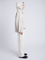 Proenza Schouler Side full length image of model wearing Isaac Hoodie in Double Face Wool in ENOKI