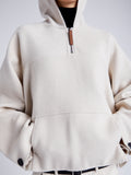 Proenza Schouler Detail image of model wearing Isaac Hoodie in Double Face Wool in ENOKI