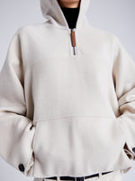 Proenza Schouler Detail image of model wearing Isaac Hoodie in Double Face Wool in ENOKI