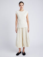 Proenza Schouler Front full length image of model wearing Lyra Top in Faux Leather in ENOKI