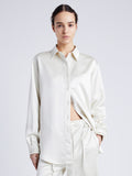 Proenza Schouler Front cropped image of model wearing Raven Shirt in Satin in ENOKI