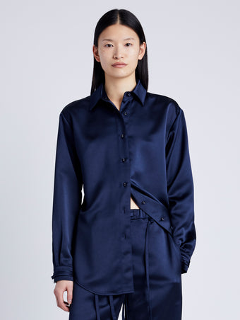 Proenza Schouler Front cropped image of model wearing Raven Shirt in Satin in INK