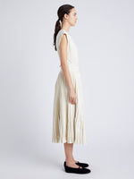 Proenza Schouler Side full length image of model wearing Rosalyn Skirt in Faux Leather in ENOKI