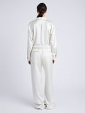 Proenza Schouler Back full length image of model wearing Magnus Pant in Satin in ENOKI