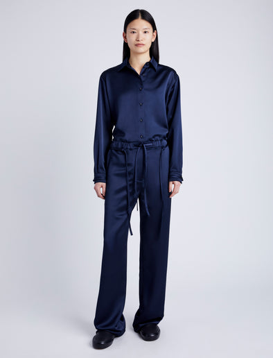 Proenza Schouler Front full length image of model wearing Magnus Pant in Satin in INK