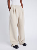 Proenza Schouler Side cropped image of model wearing Tristan Knit Pant in Cloque in OATMEAL MELANGE