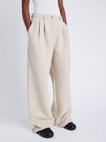 Proenza Schouler Side cropped image of model wearing Tristan Knit Pant in Cloque in OATMEAL MELANGE