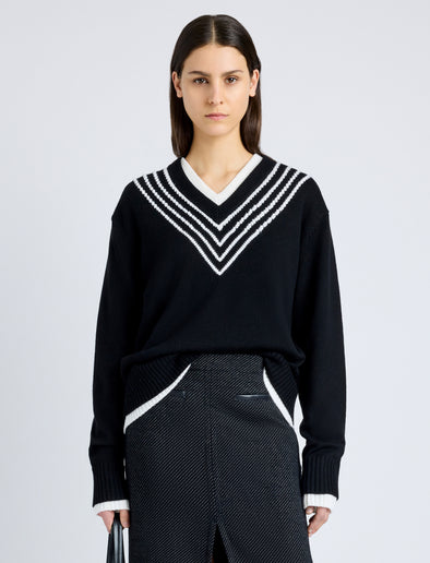 Proenza Schouler cropped front image of model wearing Gianna Top in Merino Stripe in BLACK MULTI