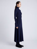 Proenza Schouler Side full length image of model wearing Phyllis Turtleneck in Geo Knits in NAVY/BLACK