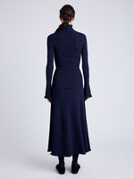 Proenza Schouler Back full length image of model wearing Phyllis Turtleneck in Geo Knits in NAVY/BLACK