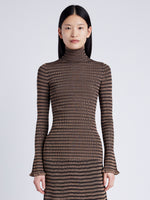 Proenza Schouler Front cropped image of model wearing Phyllis Turtleneck in Geo Knits in BROWN/BLACK