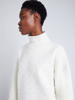 Proenza Schouler detail image of model wearing Asher Sweater in Brushed Knit in EGGSHELL