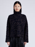 Proenza Schouler cropped front image of model wearing Asher Sweater in Brushed Knit in HICKORY/BLACK