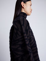 Proenza Schouler detail image of model wearing Asher Sweater in Brushed Knit in HICKORY/BLACK