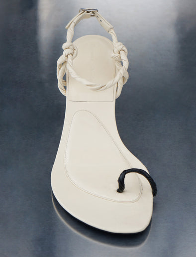 Proenza Schouler front editorial image of the Tee Toe Ring Sandals in CREAM/BLACK