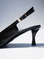 Proenza Schouler detail editorial image of Trap Slingback Pumps in BLACK