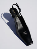 Proenza Schouler 3/4 front editorial image of Trap Slingback Pumps in BLACK