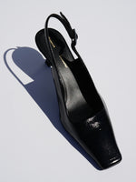 Proenza Schouler 3/4 front editorial image of Trap Slingback Pumps in BLACK