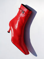 Proenza Schouler editorial image of Trap Ankle Boots in VERMILLION