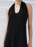 Proenza Schouler detail cropped image of model wearing Ember Dress in Light Matte Viscose Crepe in BLACK