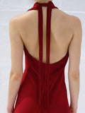 Proenza Schouler Detail cropped image of model wearing Ember Dress in Light Matte Viscose Crepe in RED