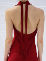 Proenza Schouler Detail cropped image of model wearing Ember Dress in Light Matte Viscose Crepe in RED